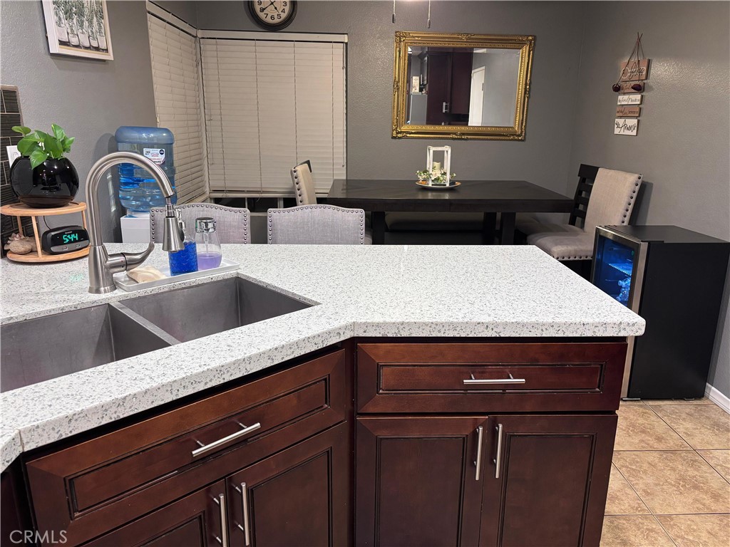 560 Coudures Way Perris, CA 92571 - Photo 28 of 35 a kitchen with a sink and cabinets