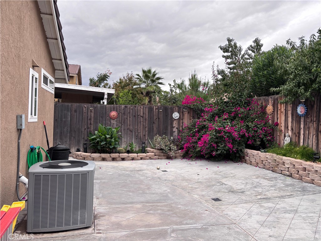 560 Coudures Way Perris, CA 92571 - Photo 33 of 35 a view of car parked in front of house