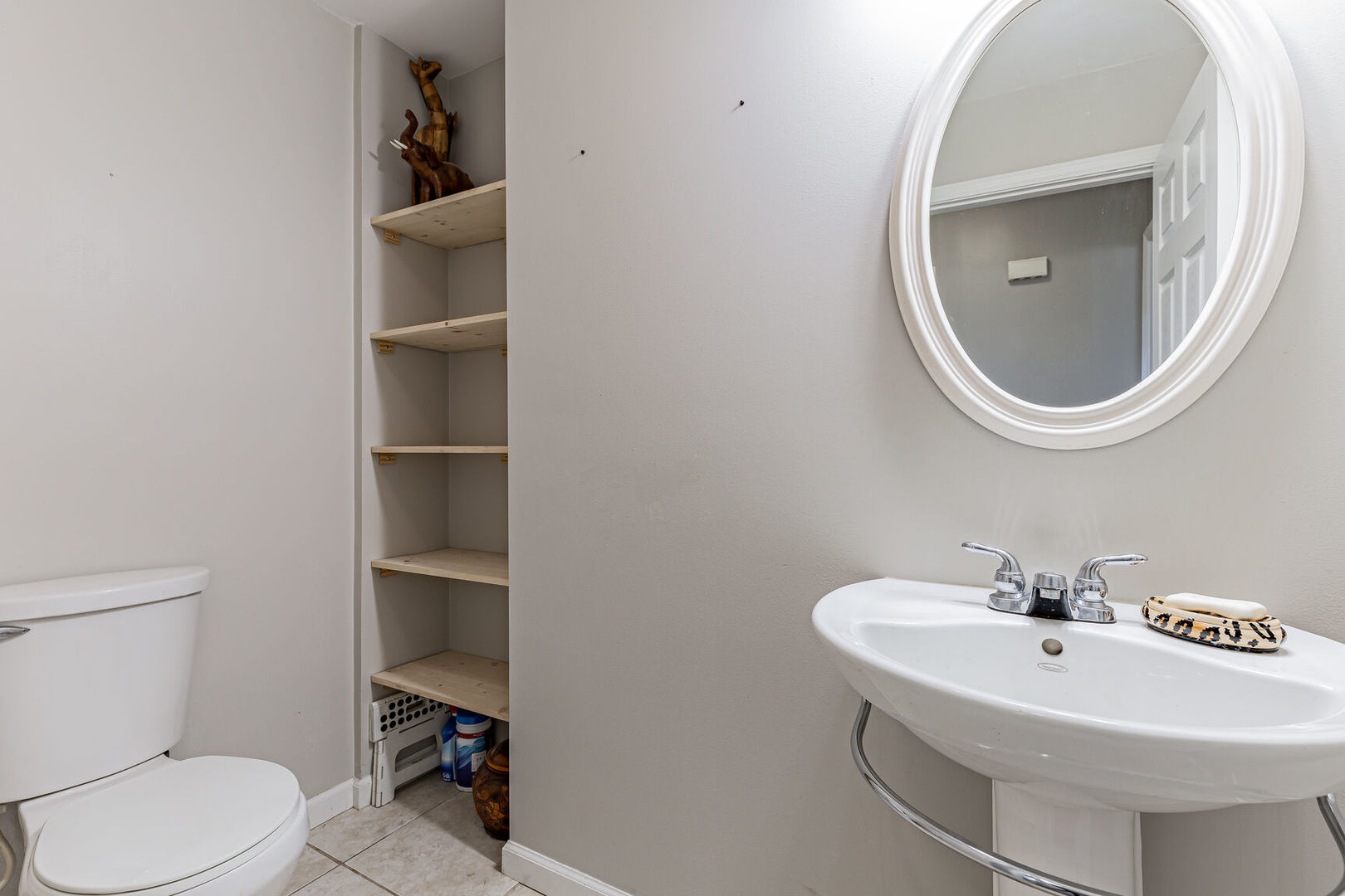315 South Garfield Avenue Champaign, IL 61821 - Photo 19 of 28 a bathroom with a toilet a sink and a mirror