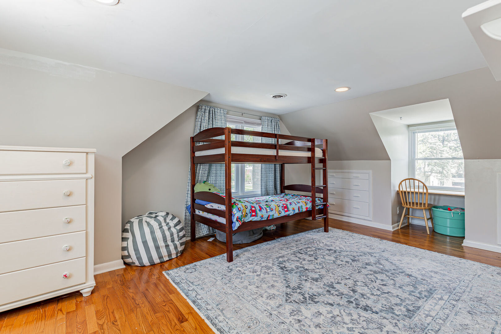 315 South Garfield Avenue Champaign, IL 61821 - Photo 23 of 28 a bedroom with furniture and a dresser