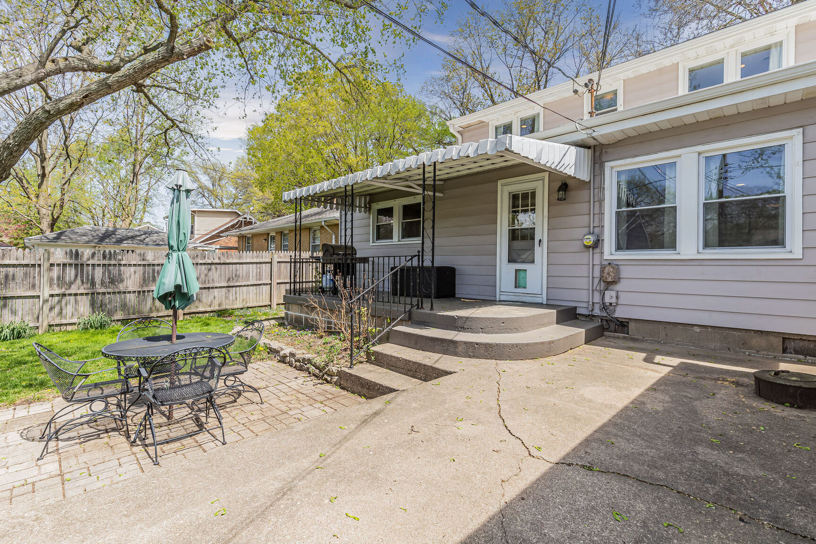 315 South Garfield Avenue Champaign, IL 61821 - Photo 27 of 28 a view of a house with backyard and sitting area