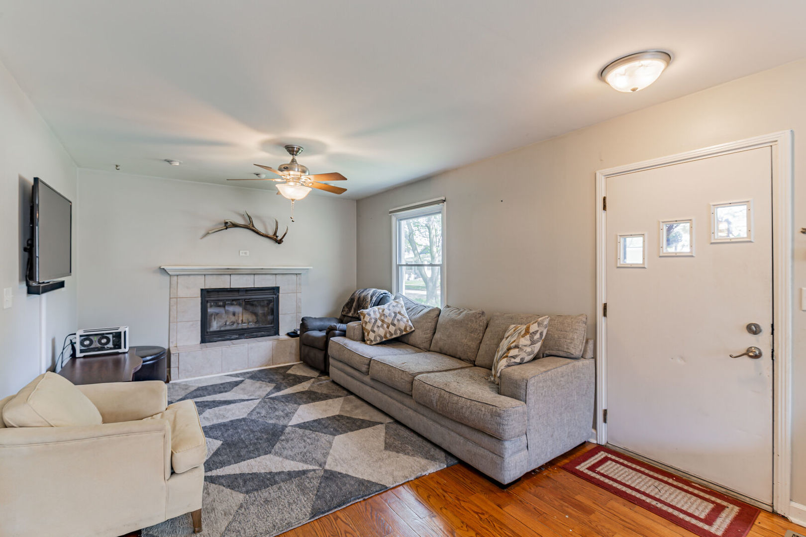 315 South Garfield Avenue Champaign, IL 61821 - Photo 6 of 28 a living room with furniture and a fireplace