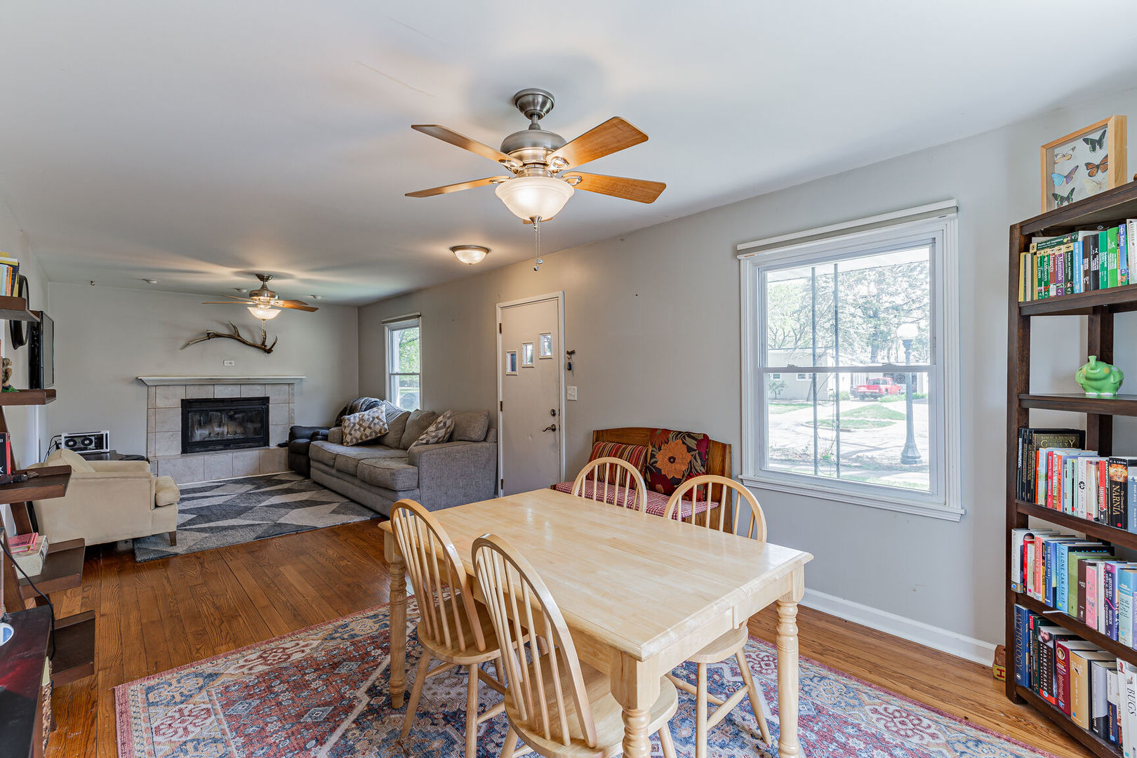 315 South Garfield Avenue Champaign, IL 61821 - Photo 9 of 28 a living room with fireplace furniture and a book shelf