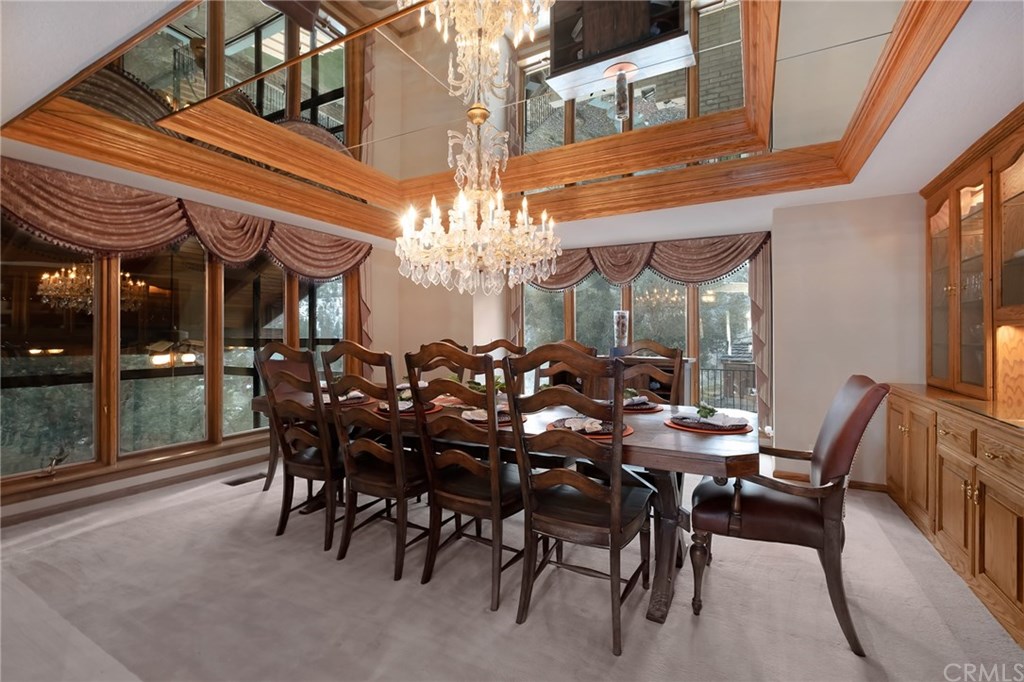 488 Highway 2 Wrightwood, CA 92397 - Photo 15 of 54 a view of a dining room with furniture and chandelier