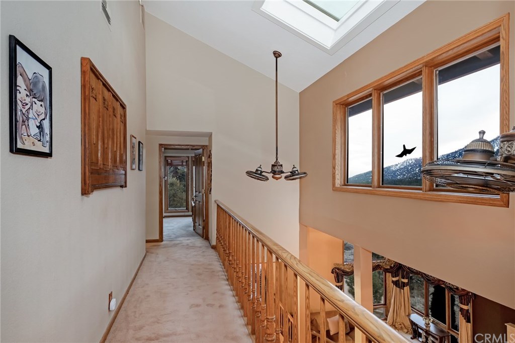 488 Highway 2 Wrightwood, CA 92397 - Photo 39 of 54 a view of a hallway with wooden floor and staircase