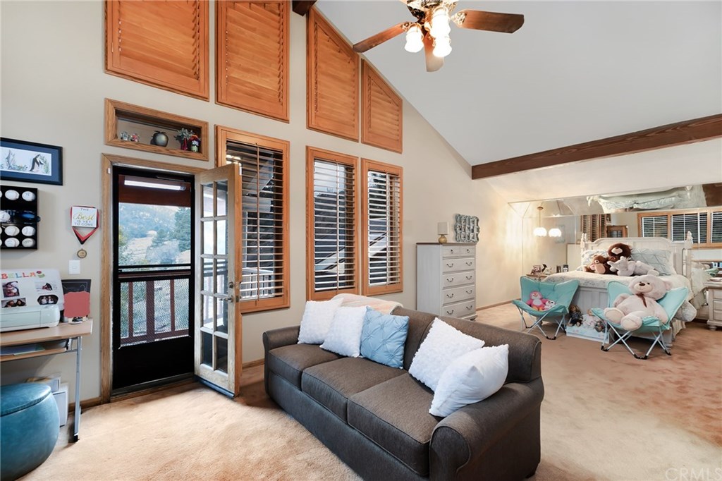 488 Highway 2 Wrightwood, CA 92397 - Photo 40 of 54 a living room with furniture and large windows
