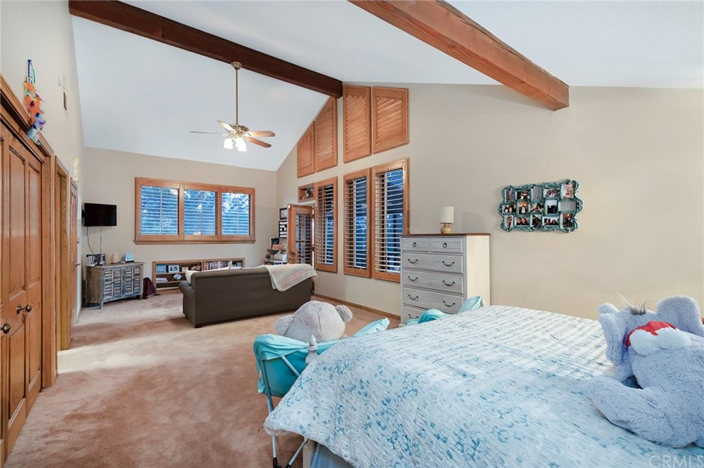 488 Highway 2 Wrightwood, CA 92397 - Photo 41 of 54 a living room with furniture and a flat screen tv