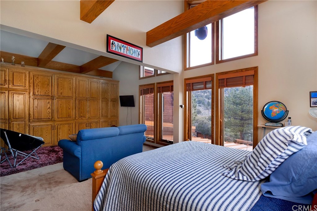 488 Highway 2 Wrightwood, CA 92397 - Photo 44 of 54 a bedroom with two beds and a window