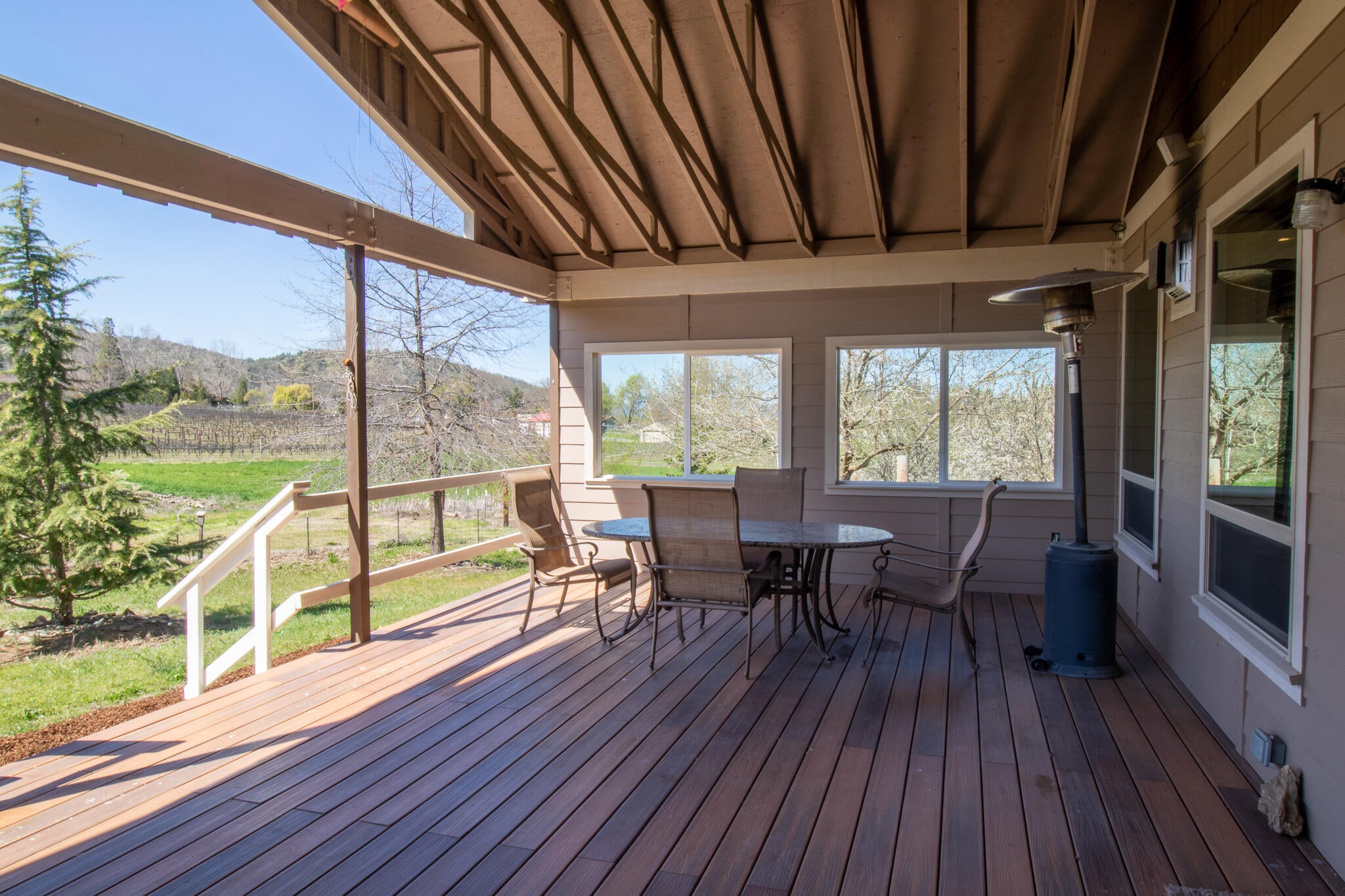 1381 Foss Road Talent, OR 97540 - Photo 23 of 41 Inviting covered back deck with expansive mountain views