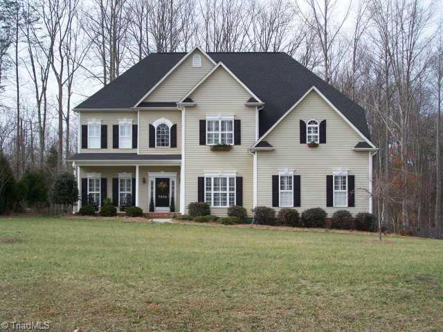 Exterior Front. Beautiful Exterior with cozy front porch, window box and headers over windows!