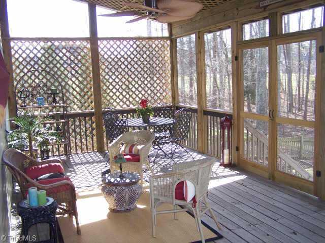7805 Wilson Farm Road Summerfield, NC 27358 - Photo 6 of 9 Other. This custom 24x12 screened porch has recessed lighting and a designer fan. It was built with many special details such as the seating, the double doors and extra wide steps!