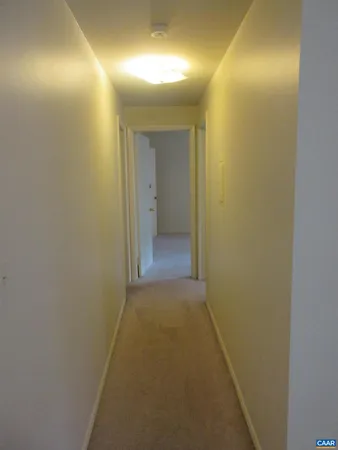 a view of hallway with shower