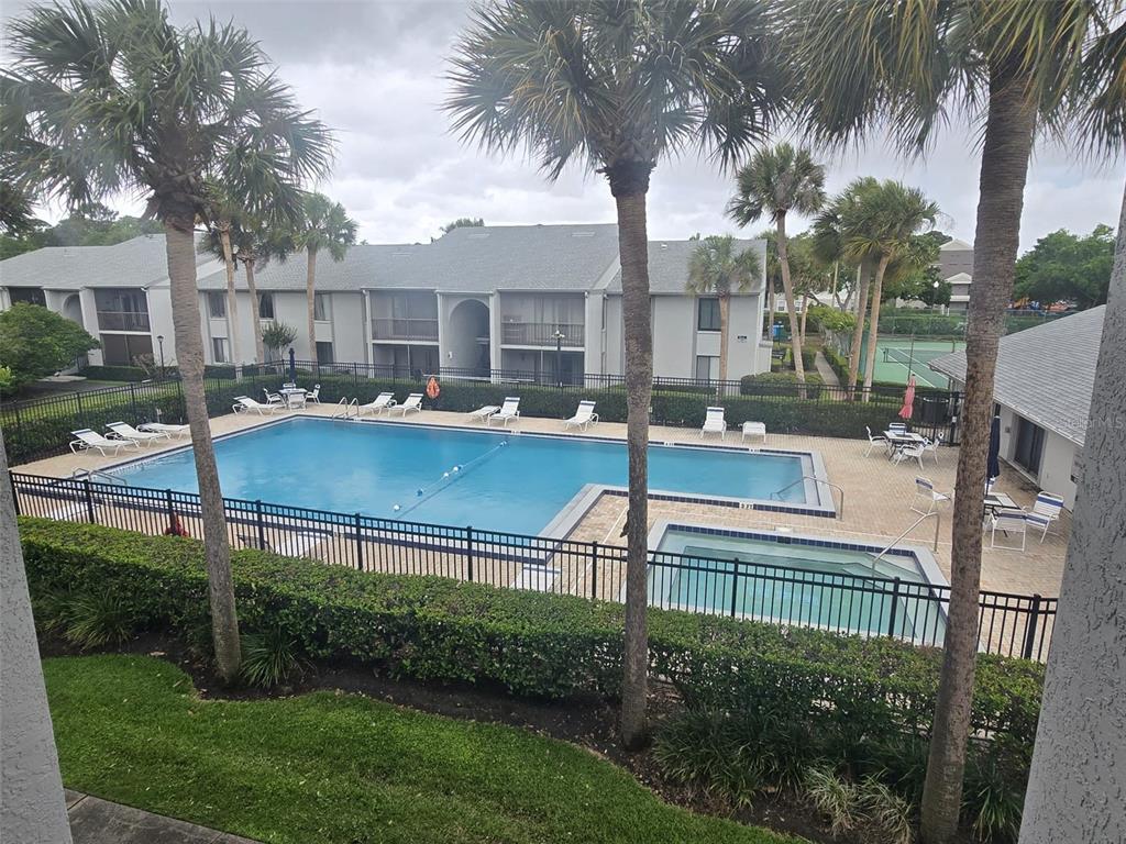 1624 South Pine Ridge Circle, Unit D2 Sanford, FL 32773 - Photo 12 of 14 a view of a house with backyard and sitting area