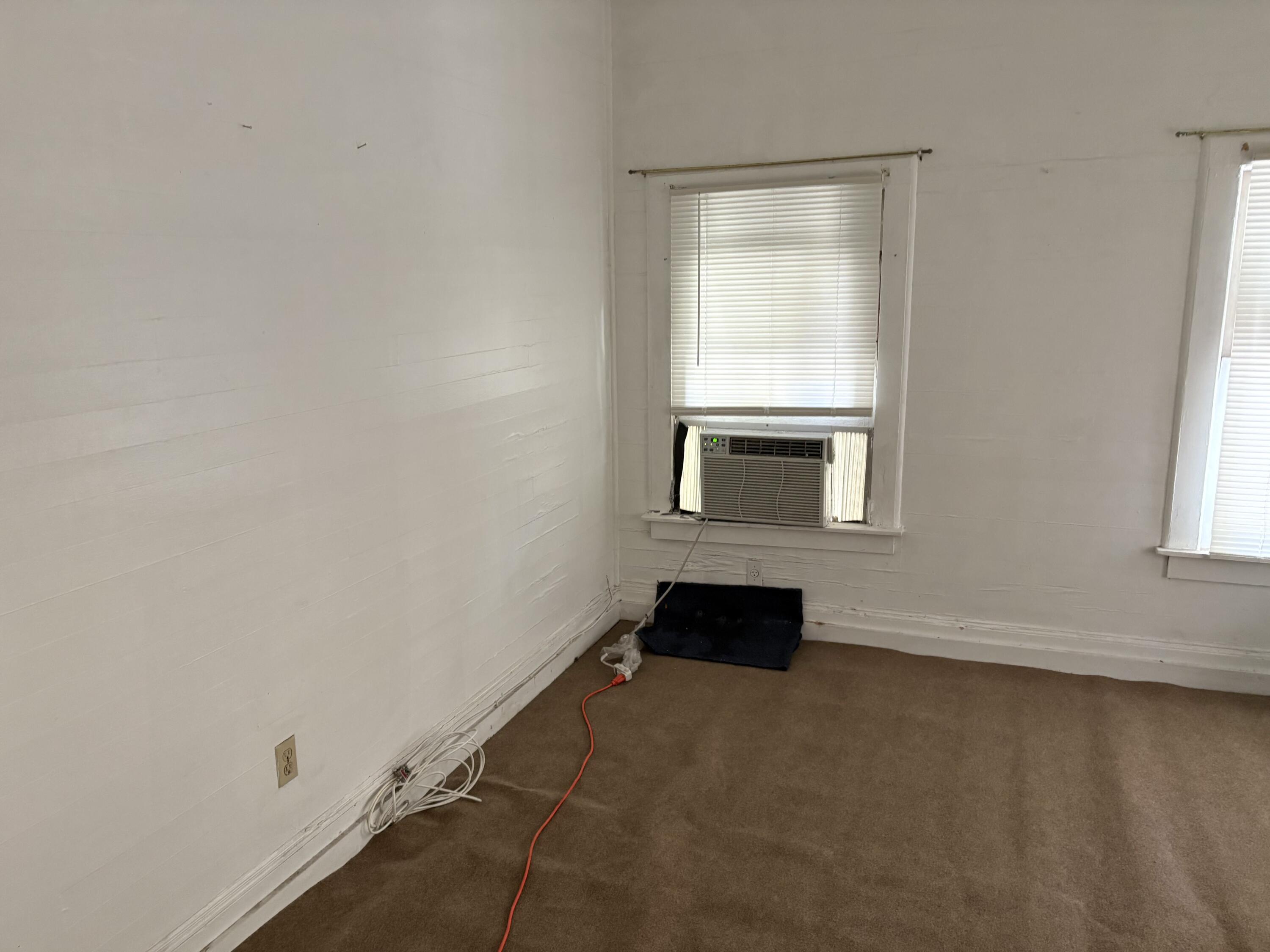 705 Chapman Lane Key West, FL 33040 - Photo 12 of 24 an empty room with a window