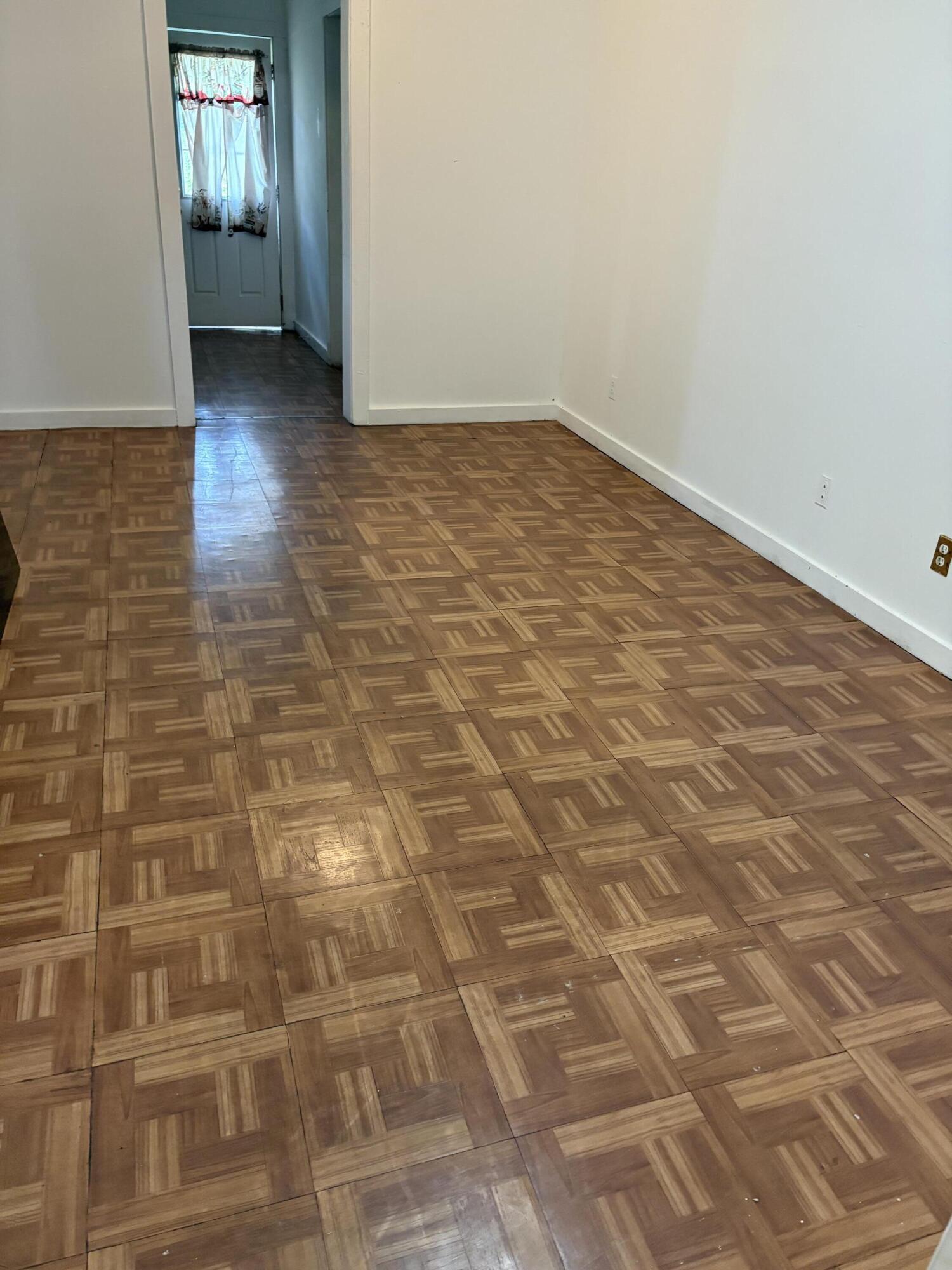 705 Chapman Lane Key West, FL 33040 - Photo 15 of 24 a view of empty room with wooden floor