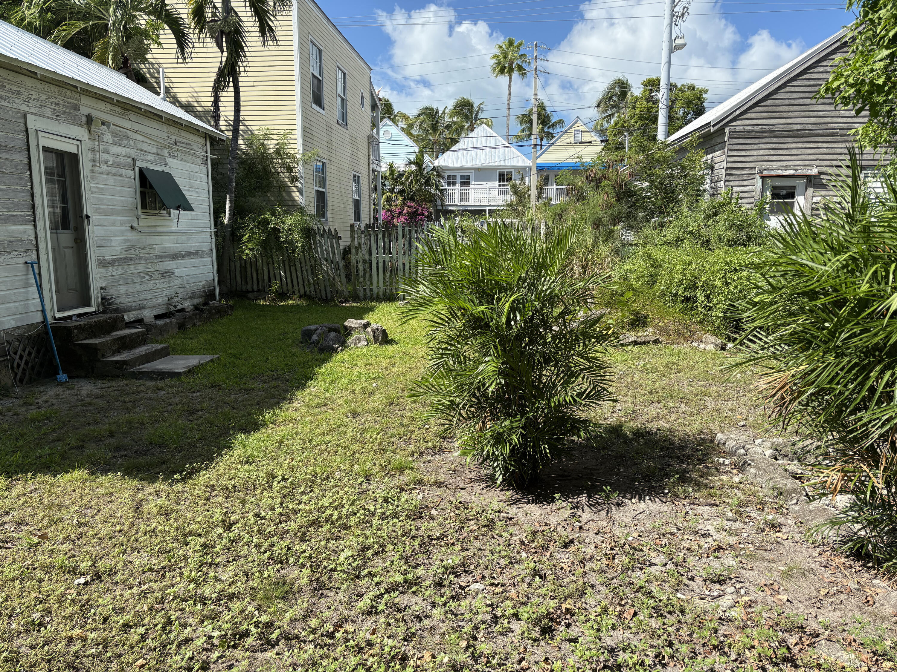705 Chapman Lane Key West, FL 33040 - Photo 8 of 24 a backyard of a house
