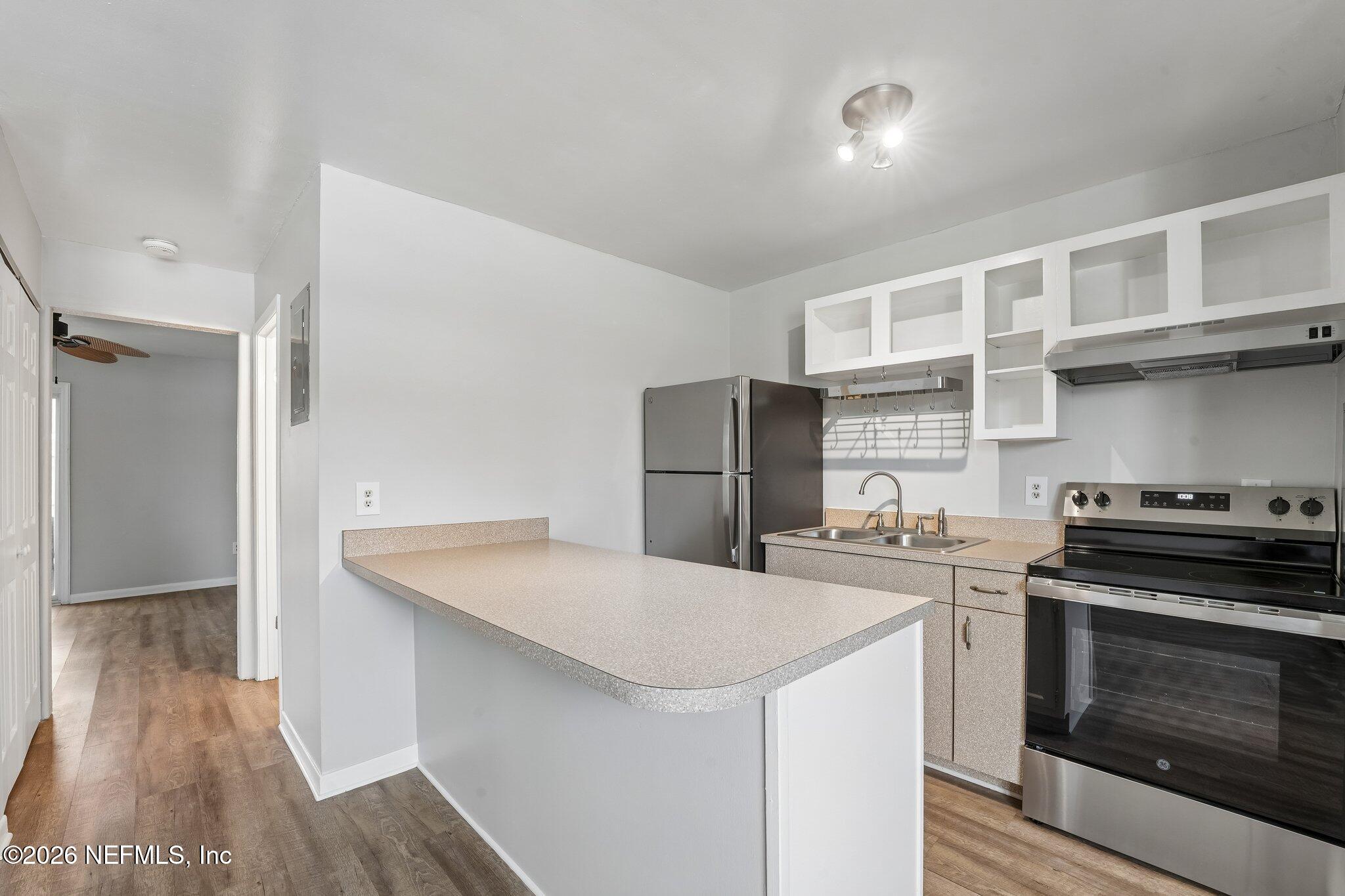 1845 Old Moultrie Road, Unit 24 St. Augustine, FL 32084 - Photo 7 of 11 Brand new Stove, Hood and Fridge!