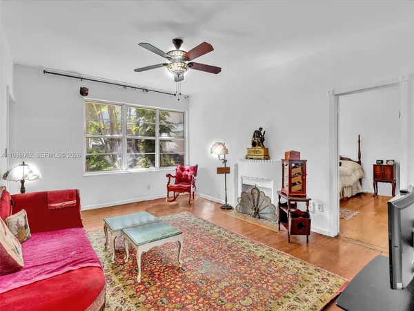 a living room with furniture and a window