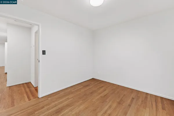 a view of small space with wooden floor