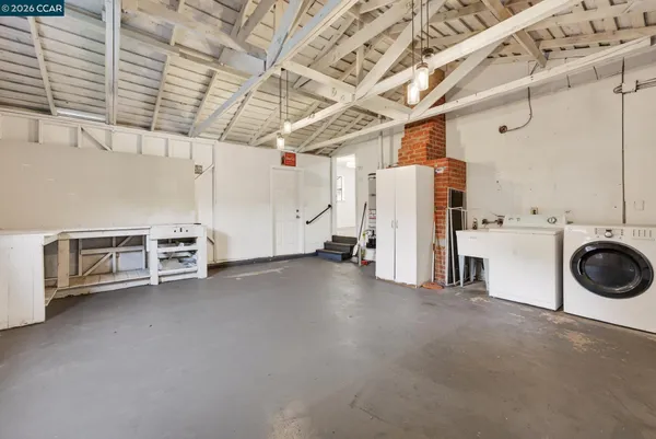 a view of a livingroom with white walls