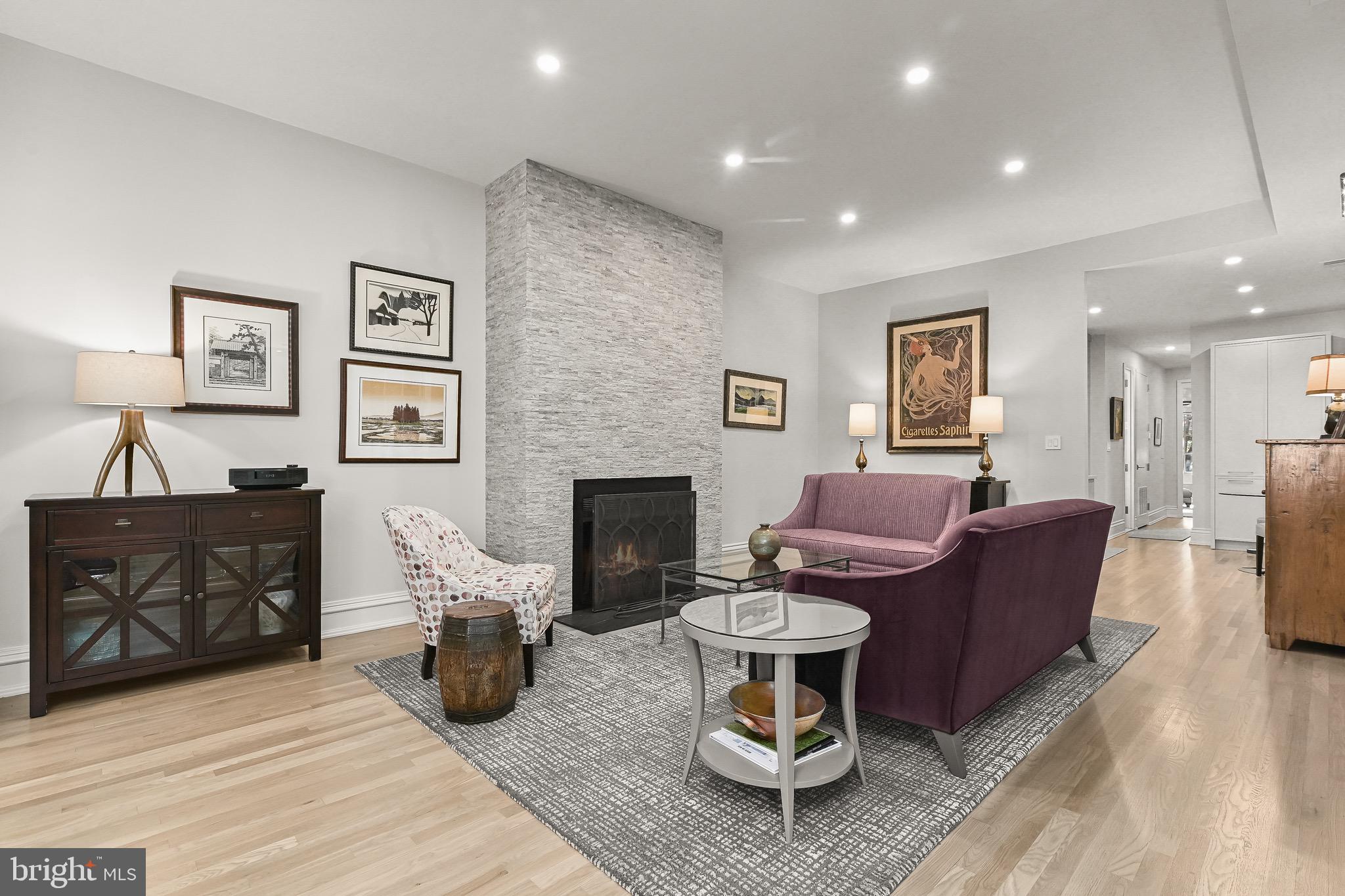 2910 Q Street Northwest, Unit A11 Washington, DC 20007 - Photo 6 of 23 Living Room w/ wood burning fireplace