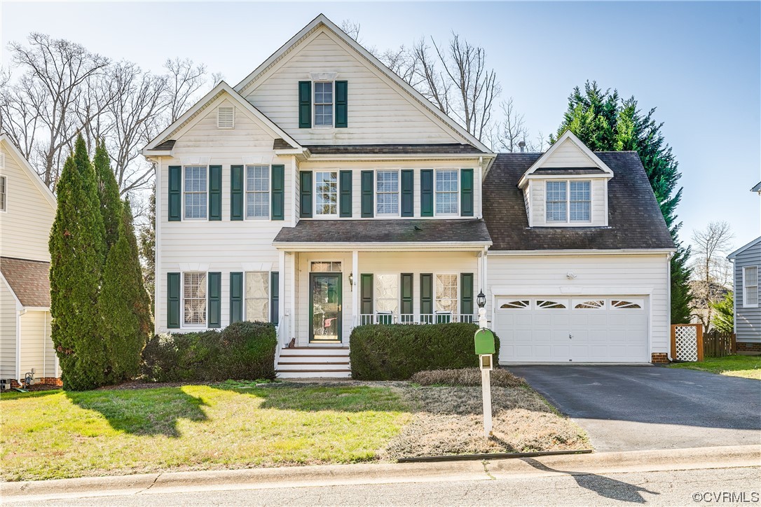 719 Biggin Pond Road Midlothian, VA 23114 - Photo 1 of 41 a front view of a house with garden