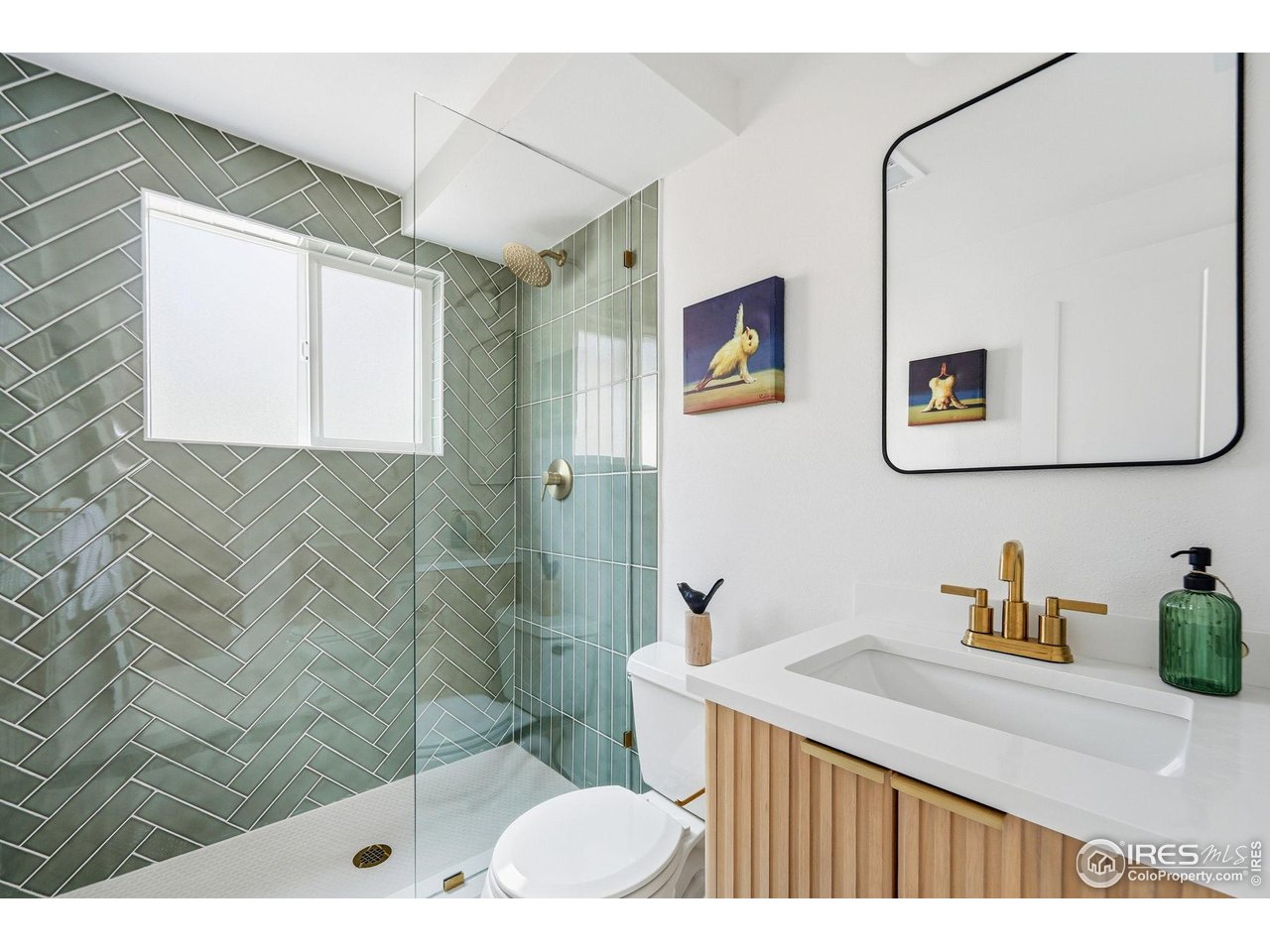 2830 Duke Circle Boulder, CO 80305 - Photo 24 of 43 Sleek tile, gold and black features with glass enclosed shower.