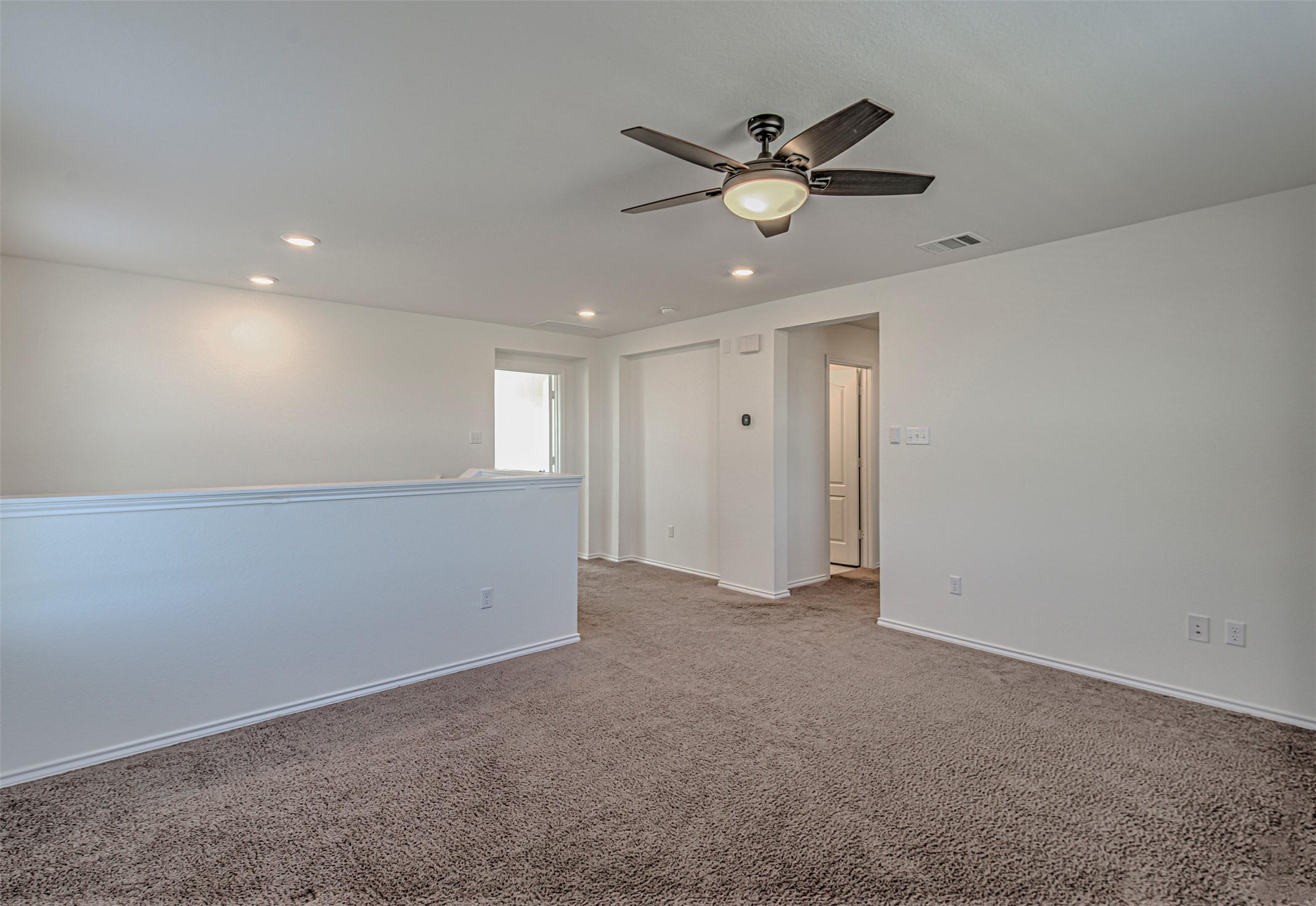 486 Gustaf Trail Kyle, TX 78640 - Photo 18 of 40 a view of an empty room