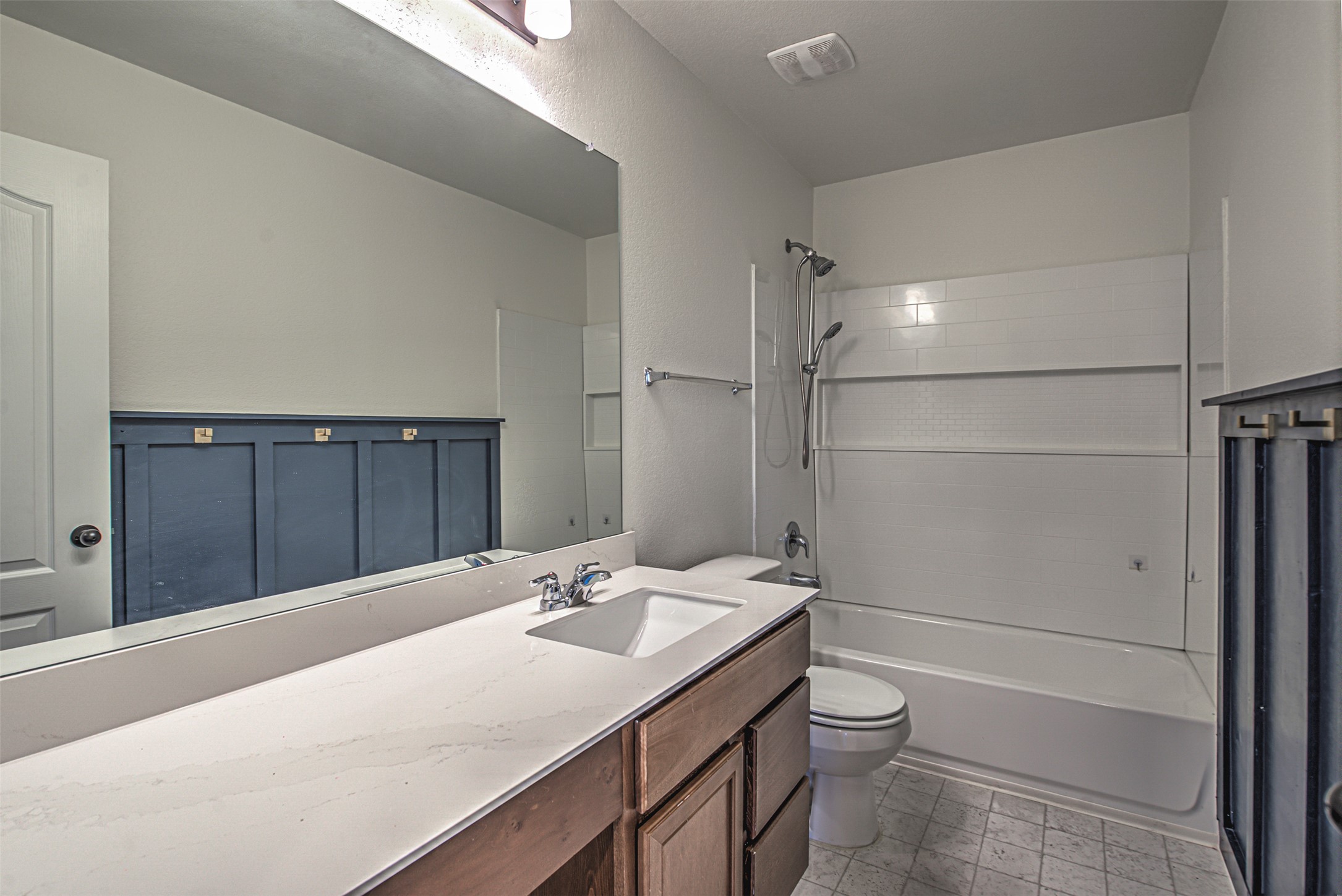 486 Gustaf Trail Kyle, TX 78640 - Photo 25 of 40 a bathroom with a sink a toilet and shower