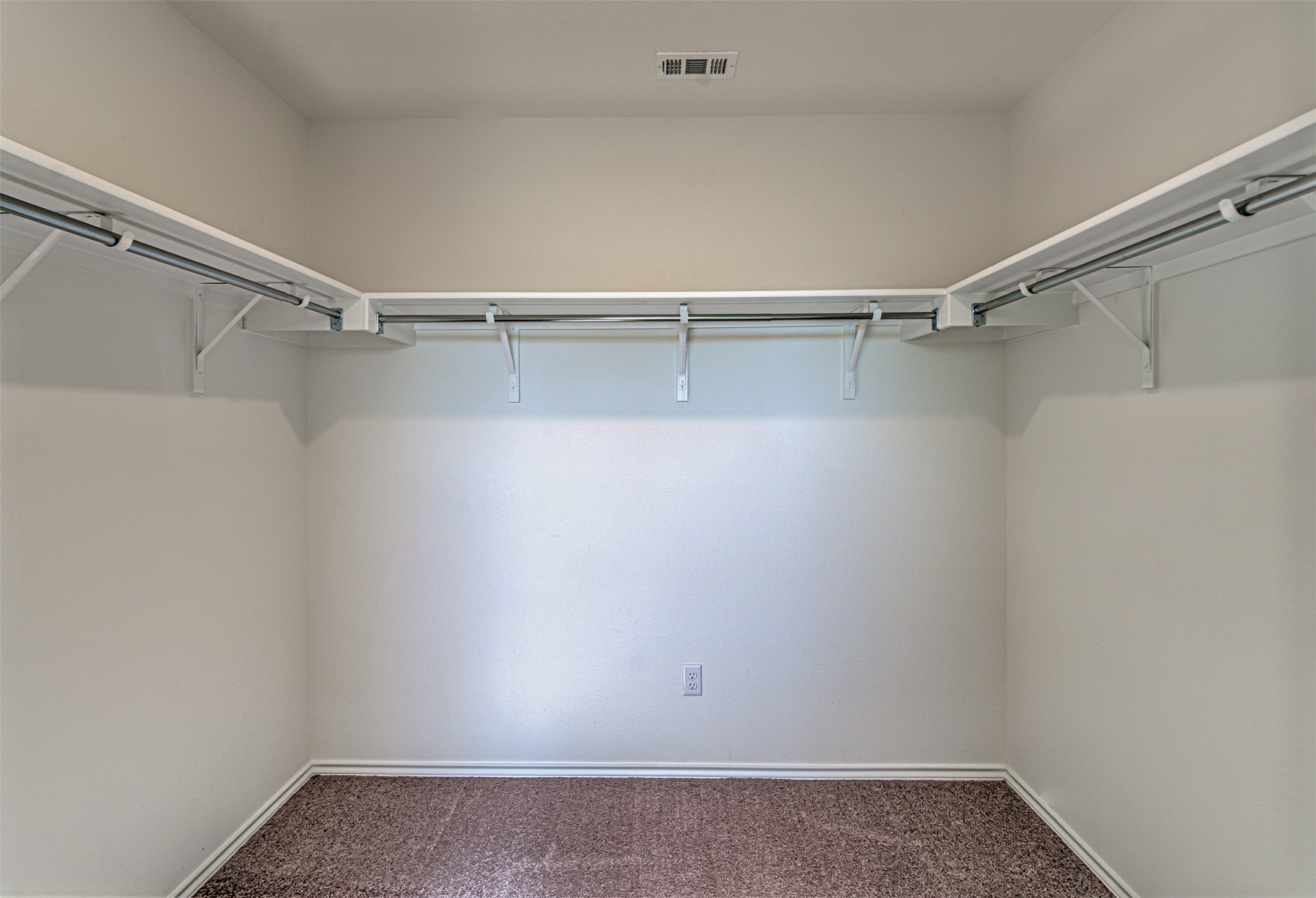 486 Gustaf Trail Kyle, TX 78640 - Photo 29 of 40 a view of an empty walk in closet