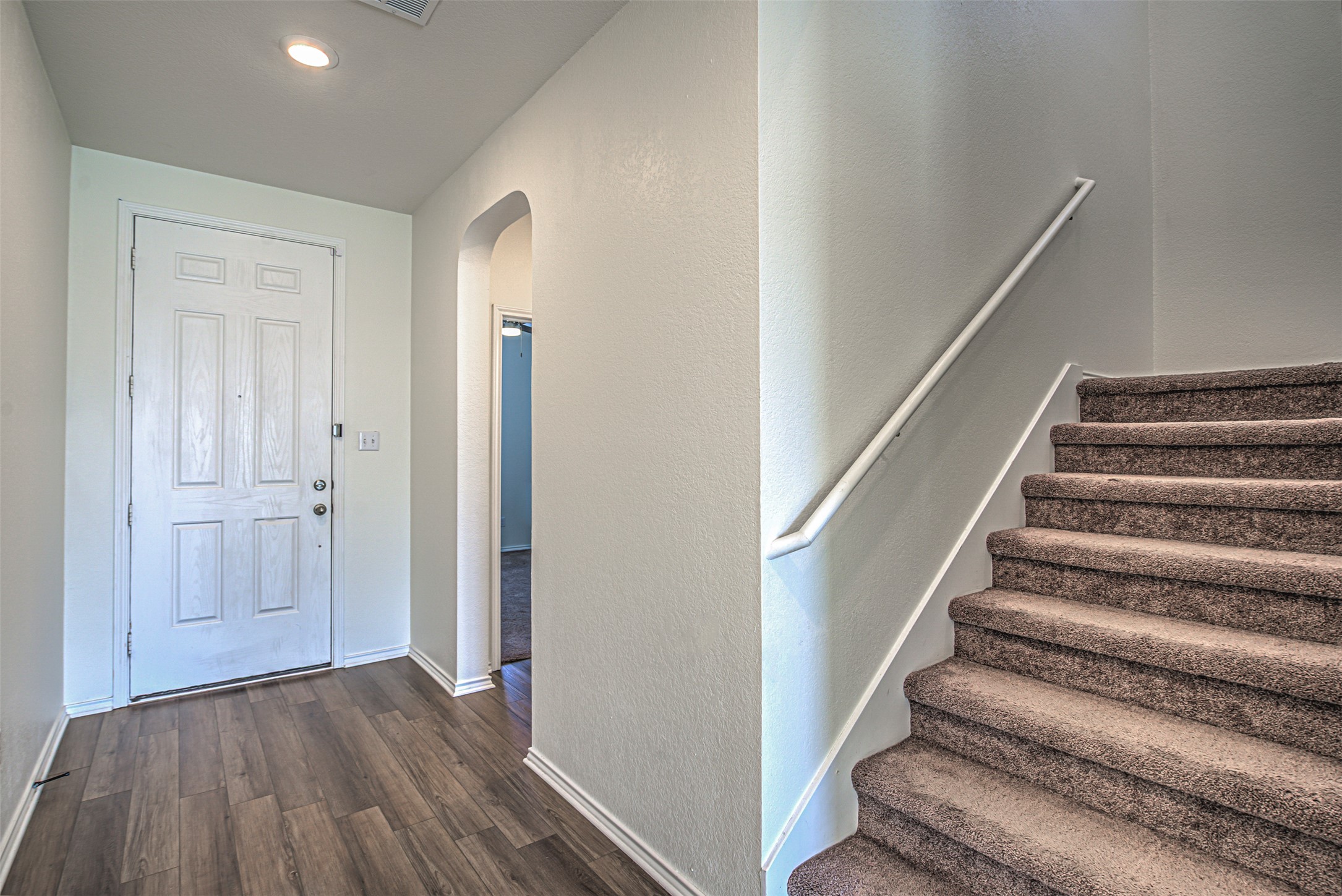 486 Gustaf Trail Kyle, TX 78640 - Photo 3 of 40 a view of entryway with wooden floor