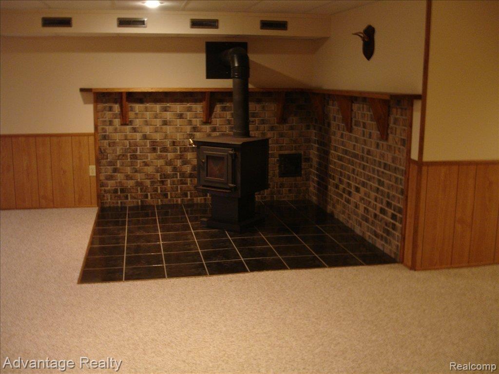 18231 Gilmore Road Armada, MI 48005 - Photo 16 of 22 wood stove /basement