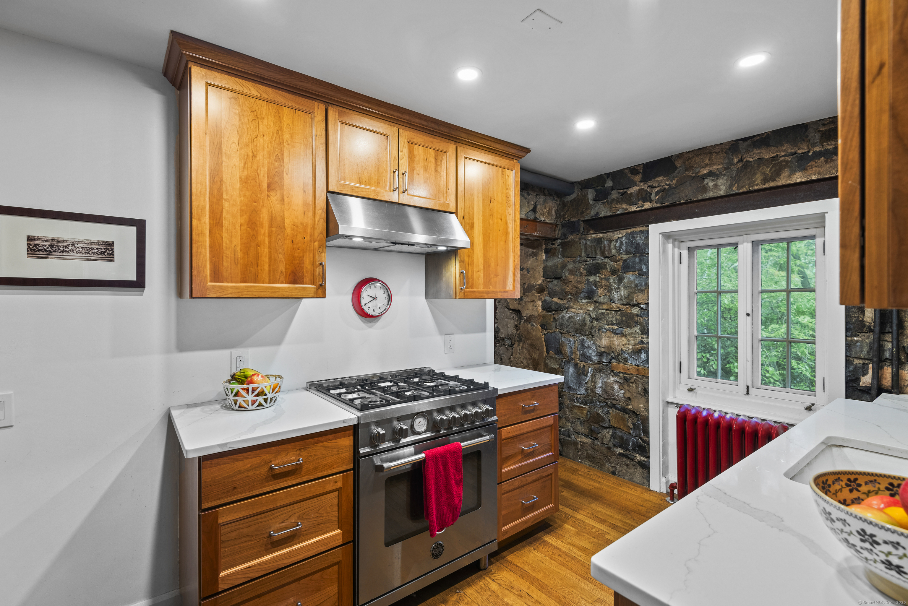 128 Blake Road Hamden, CT 06517 - Photo 8 of 25 Fully refurbished kitchen. The range vents to outside.