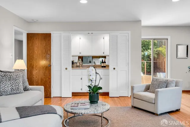 a bathroom with 2 sink and a mirror