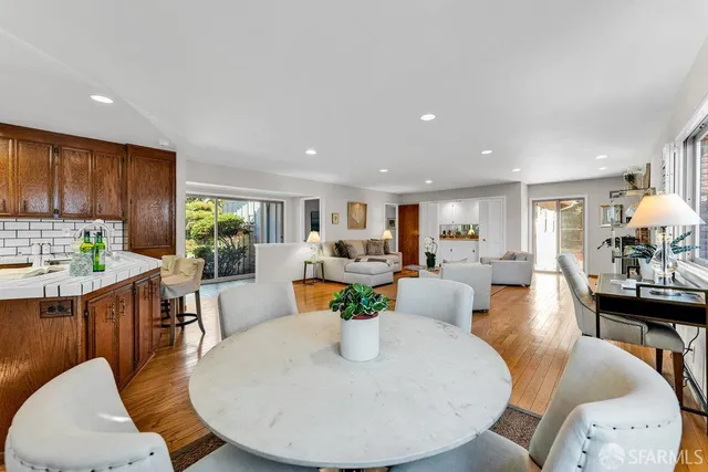 a bathroom with a shower toilet and sink