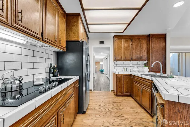 a bedroom with a bed and a table