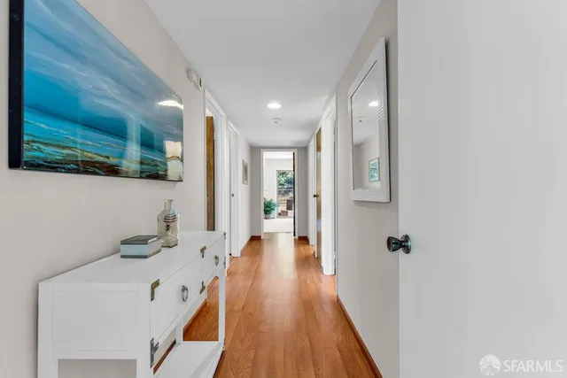 a swimming pool with barbeque oven outdoor seating