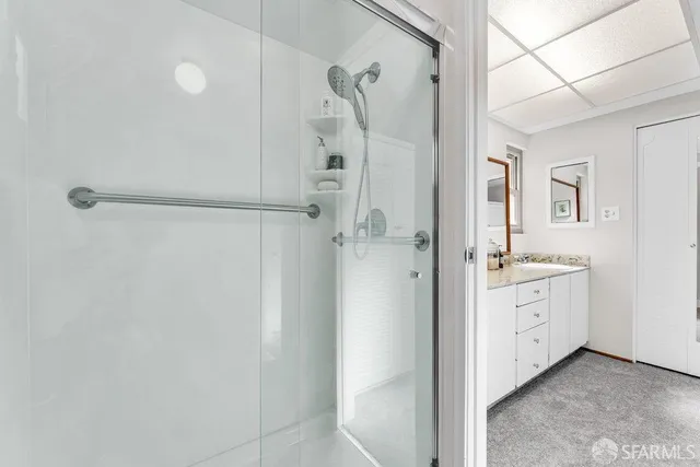 an aerial view of a house with a yard basket ball court and outdoor seating