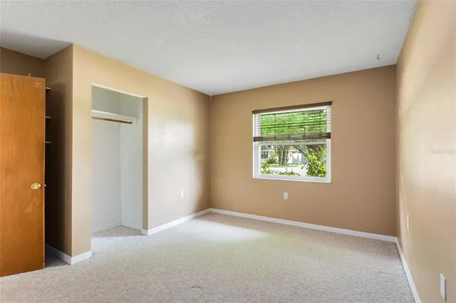 a view of a house with a big yard