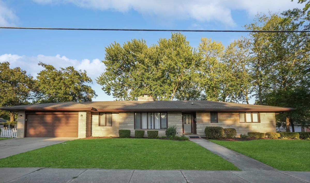 2235 West Acres Road Joliet, IL 60435 - Photo 1 of 26 a view of a house with a yard
