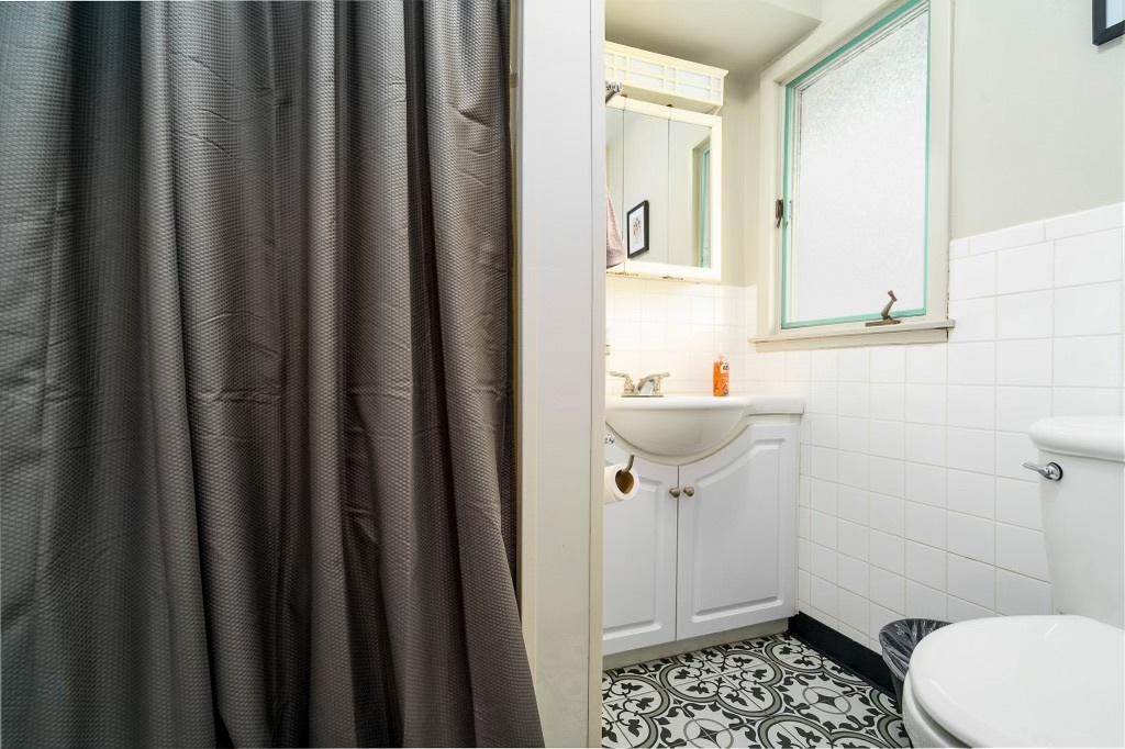 2235 West Acres Road Joliet, IL 60435 - Photo 19 of 26 a bathroom with sink and toilet