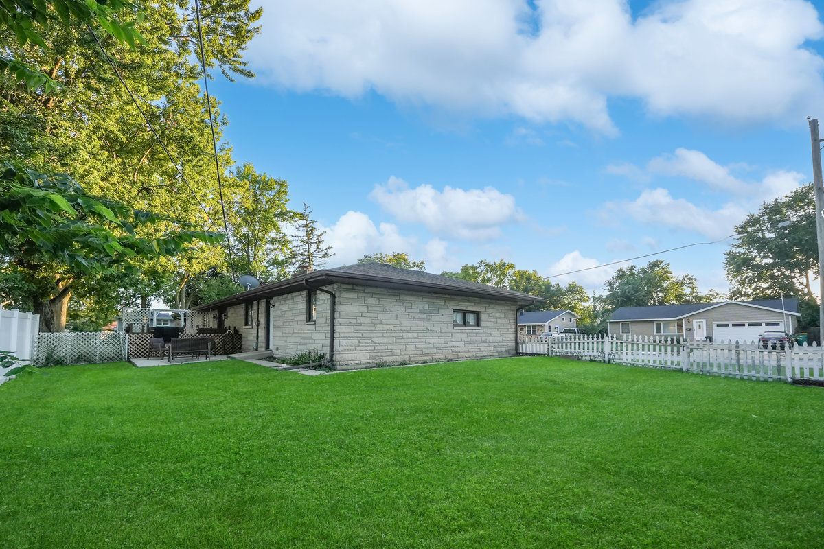 2235 West Acres Road Joliet, IL 60435 - Photo 23 of 26 a view of house with backyard
