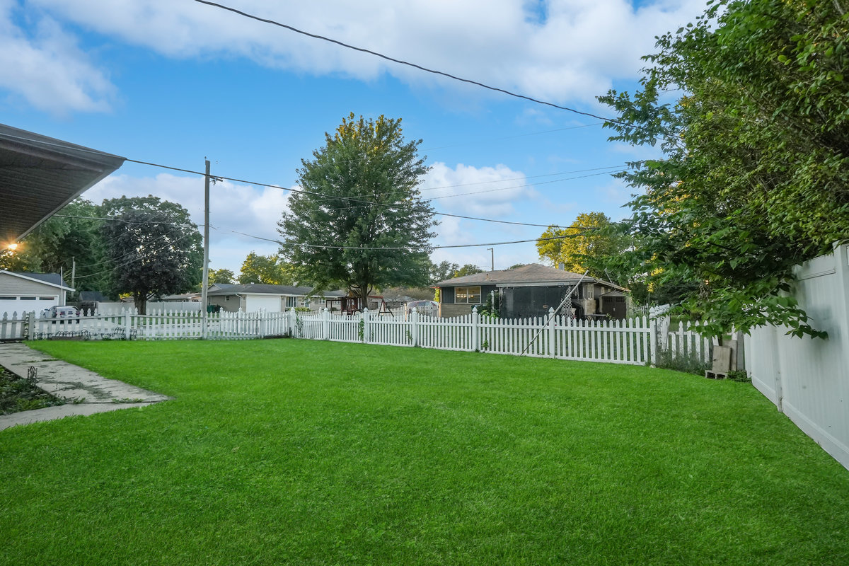 2235 West Acres Road Joliet, IL 60435 - Photo 25 of 26 a view of a back yard