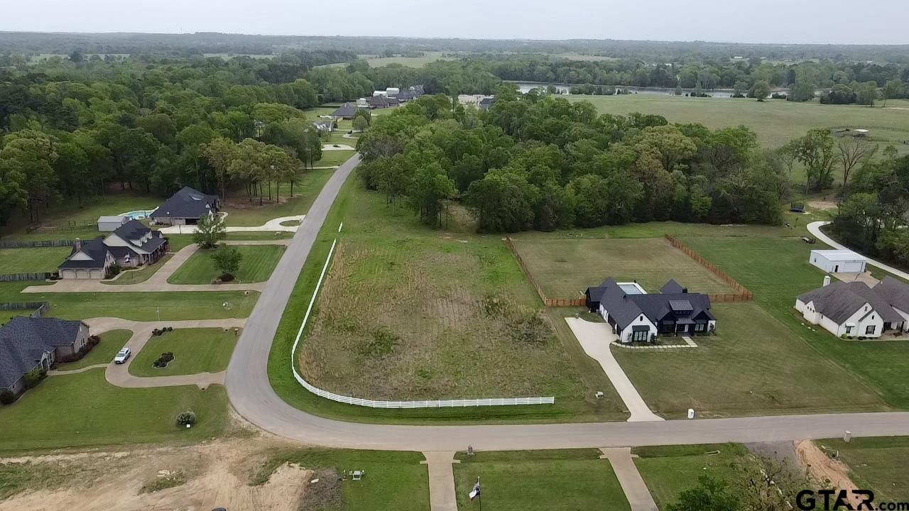 21027 Gatlinburg Road Bullard, TX 75757 - Photo 6 of 22 a view of a swimming pool with a yard