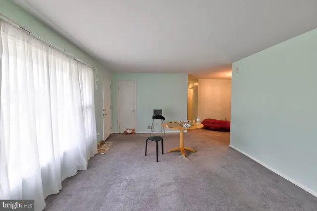 a room with toys and a window