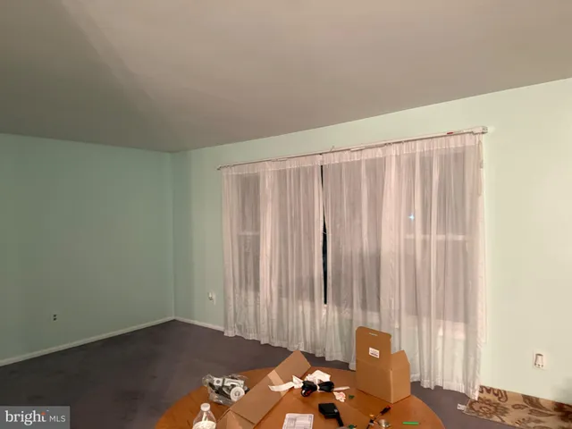 a view of a room with windows