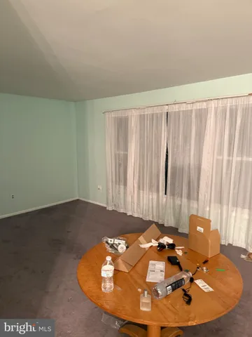 a view of a livingroom with furniture