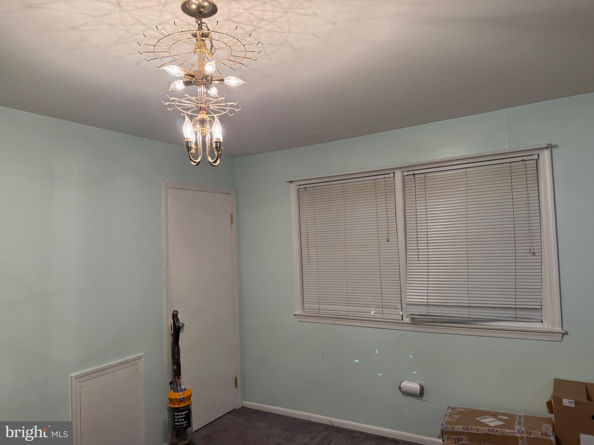 4305 Briggs Chaney Road Beltsville, MD 20705 - Photo 10 of 26 a view of a livingroom with a chandelier