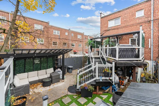 a view of a building with sitting area