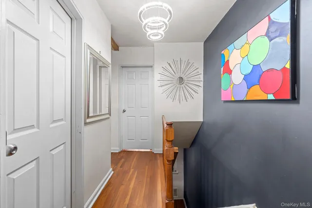 a view of entryway with wooden floor